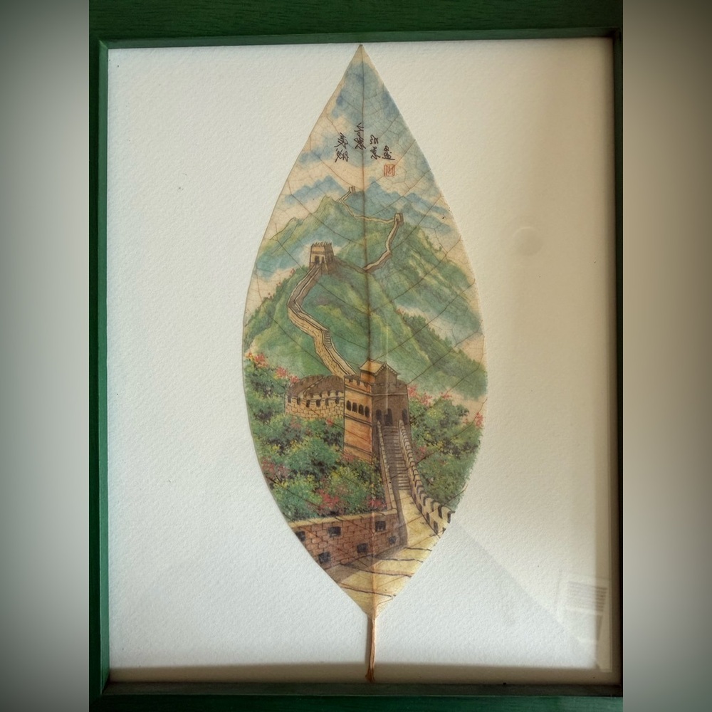 Pair of leaf paintings from China. Frames included.